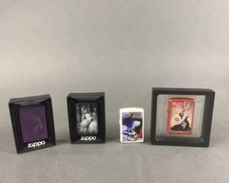 Lot 546 | Anne Stokes Zippo Lighter & More