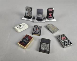 Lot 498 | 9 Zippo Graphic Lighters