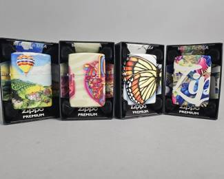 Lot 485 | 4 Zippo Premium Graphic Lighters