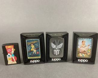 Lot 527 | Pin Up Girl , American Eagle Zippos & More