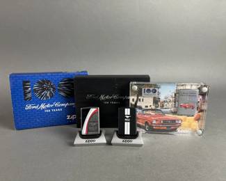 Lot 443 | 100 Year Ford, 50 Year Mustang Zippos