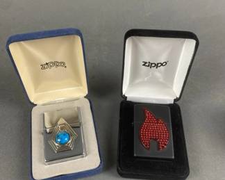 Lot 517 | 1997 Turquoise Zippo Lighter & Bling Flame Zippo