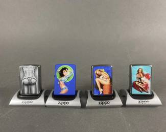 Lot 477 | 4 Zippo Pin Up Girl Lighters With Magnetic Stands