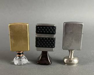 Lot 570 | 3 Zippos with Handles