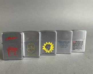 Lot 412 | 5 Vintage Advertising Zippo Lighters