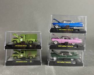 Lot 152 | Cadillac & Studebaker Die Cast Cars