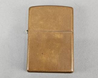Lot 572 | Vintage 2003 D03 Zippo Copper Lighter