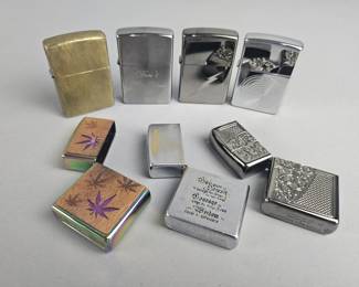 Lot 582 | Zippo Lighters & Cases