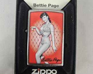 Lot 380 | Zippo Bettie Page Lighter