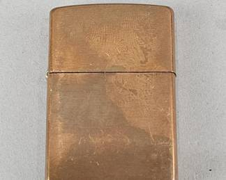 Lot 573 | C22 Zippo Copper Lighter w Black Insert