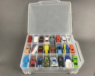 Lot 129 | 48 Hot Wheels/ Matchbox Cars With Case