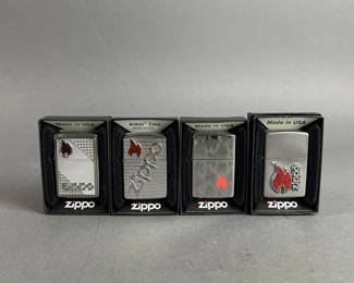 Lot 424 | 4 Red Flame Zippo Lighters