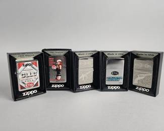 Lot 534 | Zippo Case/Colt & GLLC Graphic Lighters