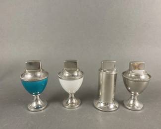 Lot 524 | 4 Zippo Table Lighters