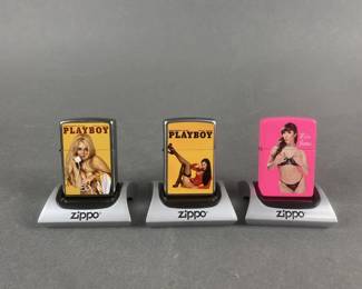 Lot 467 | 3 Zippo Playboy Lighters With Magnetic Stands