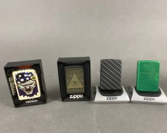 Lot 471 | Evil Clown Zippo Lighter & More