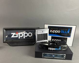 Lot 587 | Zippo, Blu, Display Items