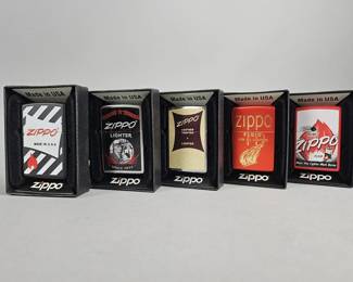 Lot 447 | Zippo Graphic Windproof Lighters
