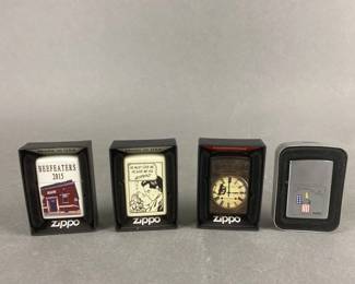 Lot 494 | Beefeater's 2015 Zippo Lighter & More