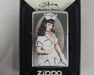 Lot 96 | Olivia De Berardinis Bettie Page Zippo Lighter
