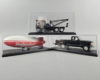 Lot 151 | Die Cast '84 Freightliner, Budweiser Blimp & More!