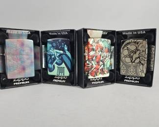 Lot 488 | 4 Zippo Premium Graphic Lighters
