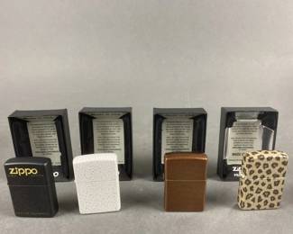 Lot 454 | 4 Genuine Zippo Lighters