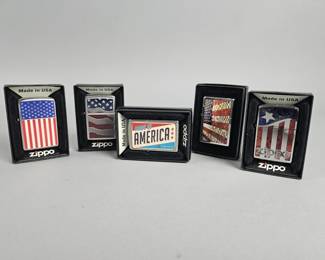 Lot 420 | Zippo American Flag Lighters & More!