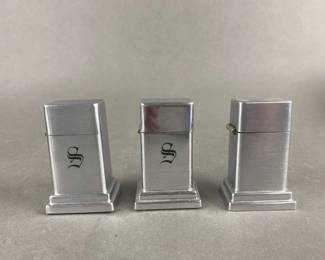Lot 457 | 3 Vintage Zippo Table Lighters