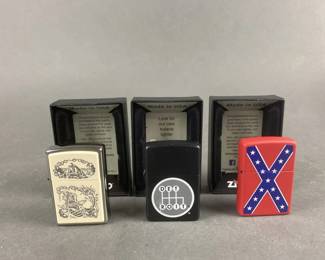 Lot 453 | Liberty Eagle Scrimshaw Zippo & More