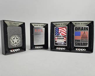 Lot 437 | Zippo 84/100 Drain The Swamp Lighters & More!