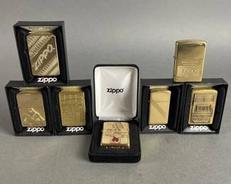 Lot 427 | Gold Toned Zippos
