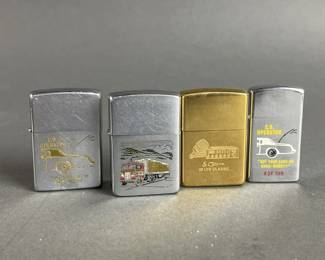 Lot 407 | 4 Vintage C.B. Radio/Truck Driver Zippos