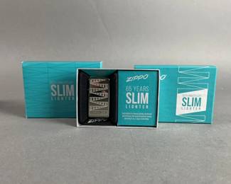 Lot 449 | Zippo 65 Years Slim Lighter