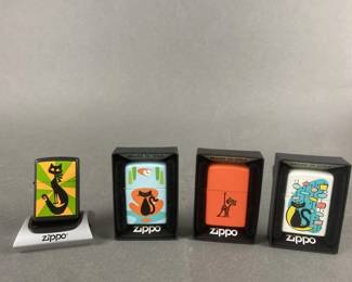 Lot 495 | 4 Zippo Cat Lighters