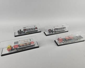 Lot 128 | Vintage Coke M2 Machines Auto Haulers & More!