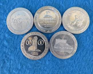 Lot 304. Five old casino tokens.&nbsp; Many are from closed casinos.