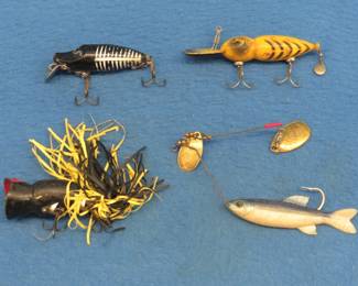Lot 72. Four vintage baits