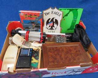 Lot 345. Books, a tripod, light, and more