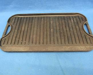 Lot 157. Lodge cast-iron griddle.&nbsp; 20" x 10.5"