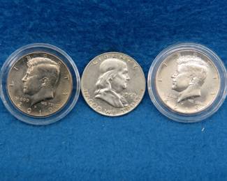 Lot 142. 1958 D Franklin half and two clad 2019 Kennedy halves