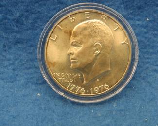 Lot 99. 1976 S Type 1 toned unc. Eisenhower dollar