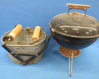 Lot 338. Used small weber grill and metal mop bucket