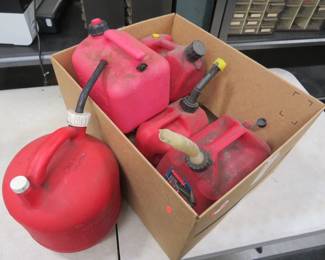 Lot 123. Five 1, 2 and 2 /12-gallon gas cans