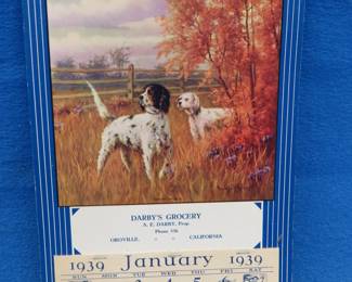 Lot 354. 1939 advertising calendar from Darby's Grocery in Oroville, CA in excellent condition enhanced with two English setters