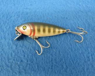 Lot 222. Vintage Pflueger 2 1/2" wooden Mustang crankbait in excellent condition