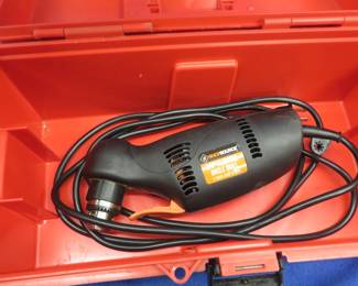 Lot 28. 3/8" close quarters drill in working condition with plastic tool box