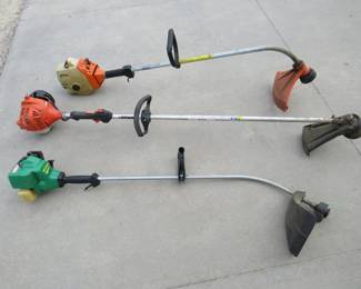 Lot 284. Three string trimmers: Stihl, Echo, WeedEater. The Echo runs the other two have good compression
