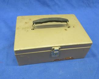 Lot 25. Metal box with staplers and staples