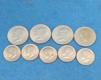 Lot 187. Four Eisenhower Bicentennial dollars and five Kennedy Bicentennial half dollar coins